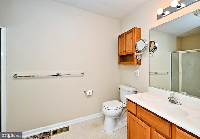1664 Brynne Ln, Pottstown, PA 19464 - full bathroom with a shower stall, toilet, tile patterned floors, vanity, and baseboards