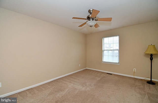 1664 Brynne Ln, Pottstown, PA 19464 - unfurnished room featuring light carpet, baseboards, and a ceiling fan