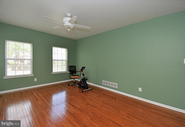 1664 Brynne Ln, Pottstown, PA 19464 - exercise room with wood-type flooring, ceiling fan, and baseboards
