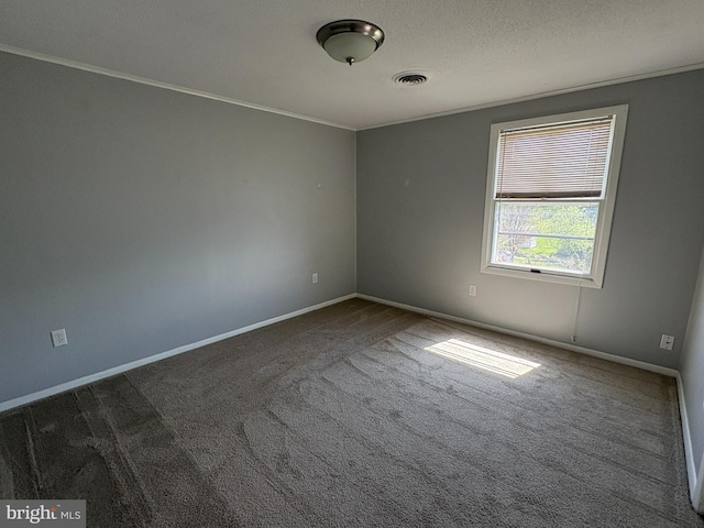 16 W Ninth St, Waynesboro, PA 17268 - unfurnished room featuring carpet floors, baseboards, ornamental molding, and a textured ceiling