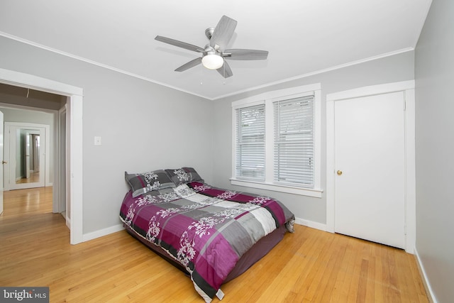 449 Audubon Ave, Audubon, NJ 08106 - bedroom featuring baseboards, crown molding, wood finished floors, and ceiling fan