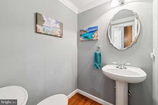 45 Saint Marys Ln, Stafford, VA 22556 - half bathroom featuring toilet, crown molding, wood finished floors, and baseboards