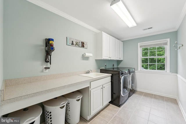 45 Saint Marys Ln, Stafford, VA 22556 - washroom featuring cabinet space, independent washer and dryer, ornamental molding, baseboards, and light tile patterned floors