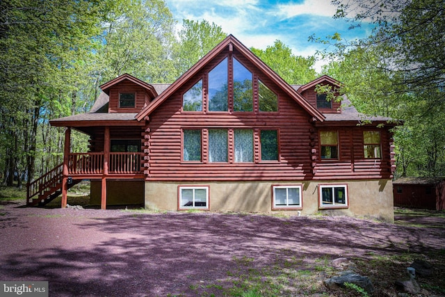 194 Thornberry Ln, Blakeslee, PA 18610 - rear view of property featuring log siding and stairs