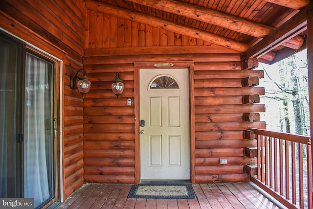 194 Thornberry Ln, Blakeslee, PA 18610 - view of exterior entry featuring log exterior and a balcony