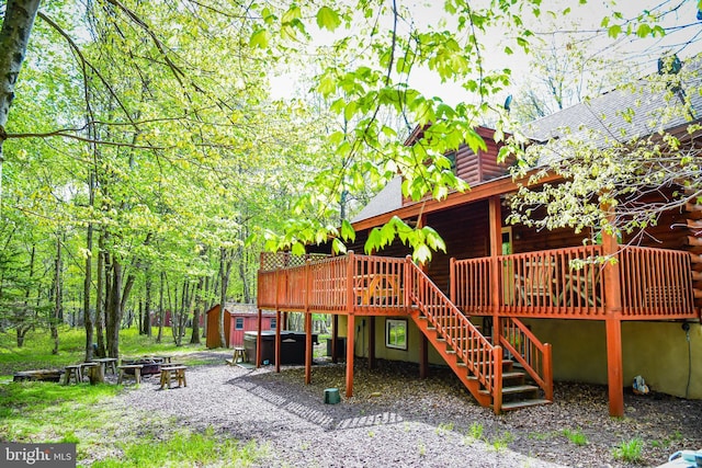 194 Thornberry Ln, Blakeslee, PA 18610 - view of playground with stairs, a deck, and an outdoor fire pit