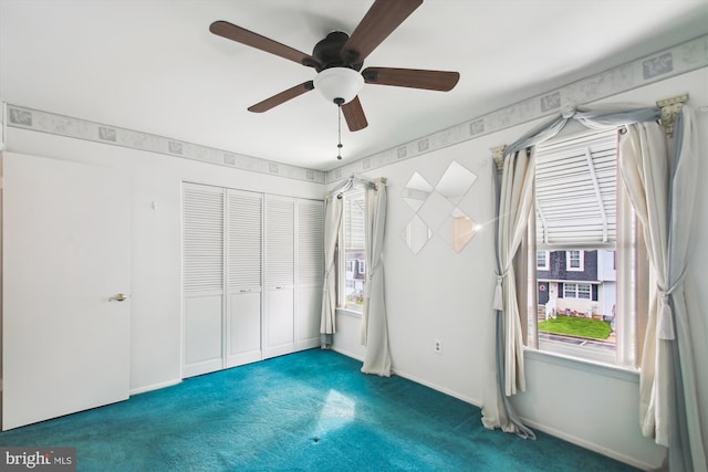38 Western Winds Cir Unit 38, Baltimore, MD 21244 - unfurnished bedroom featuring carpet flooring, a closet, and a ceiling fan