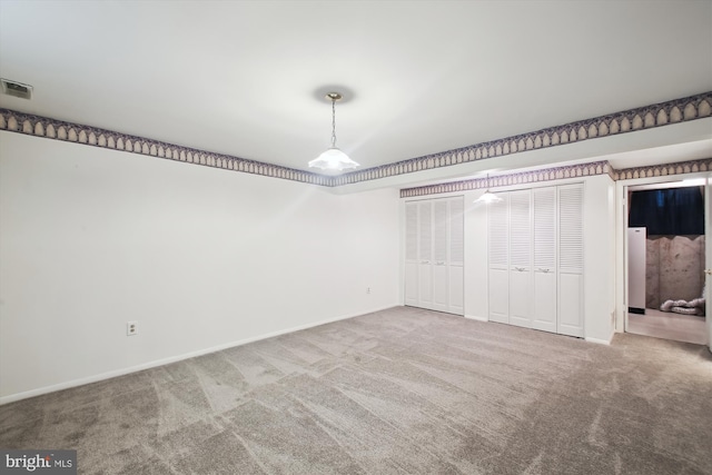 38 Western Winds Cir Unit 38, Baltimore, MD 21244 - unfurnished bedroom with carpet, two closets, and baseboards