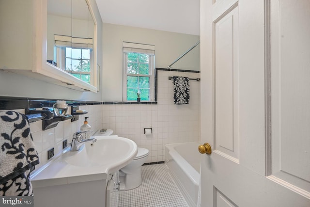 5408 Wehawken Rd, Bethesda, MD 20816 - full bathroom featuring tile patterned flooring, toilet, vanity, tile walls, and bathing tub / shower combination