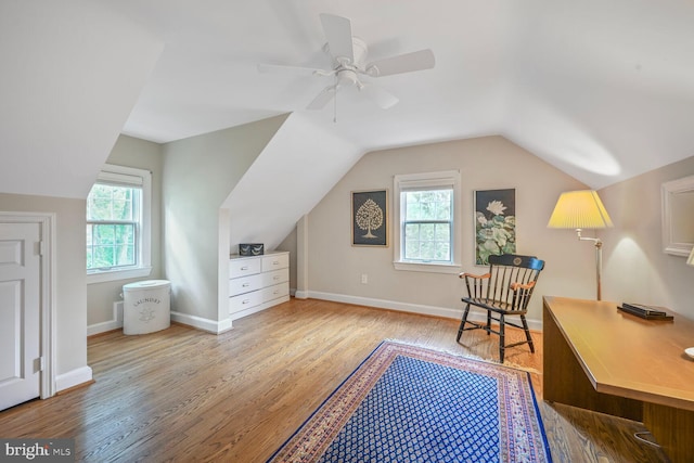 5408 Wehawken Rd, Bethesda, MD 20816 - living area featuring healthy amount of natural light, wood finished floors, vaulted ceiling, baseboards, and ceiling fan