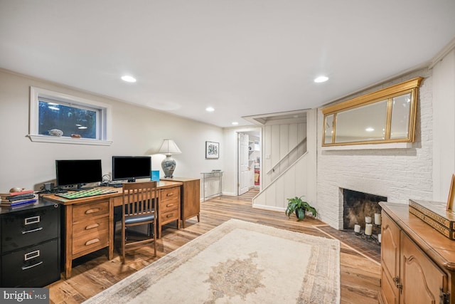 5408 Wehawken Rd, Bethesda, MD 20816 - office with light wood-style flooring, a fireplace, and recessed lighting