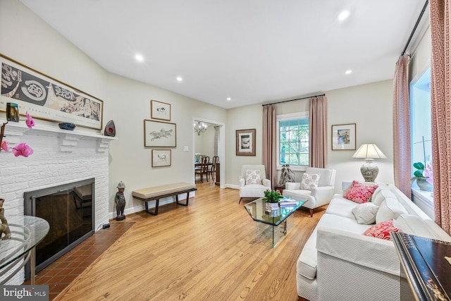 5408 Wehawken Rd, Bethesda, MD 20816 - living area with recessed lighting, a fireplace, wood finished floors, and baseboards