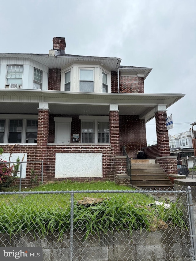 1512 Lindley Ave, Philadelphia, PA 19141 - multi unit property featuring covered porch and brick siding