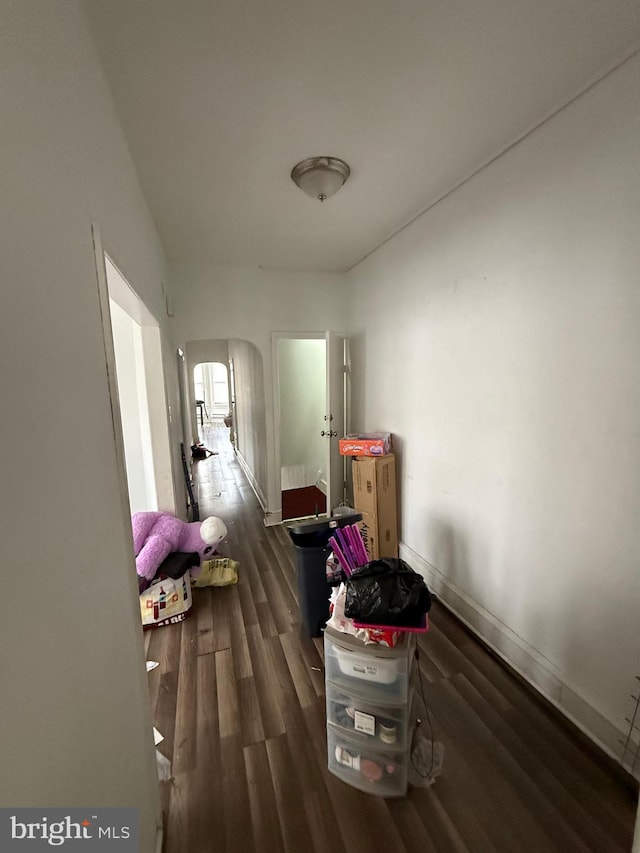 1512 Lindley Ave, Philadelphia, PA 19141 - corridor with wood finished floors, arched walkways, and baseboards