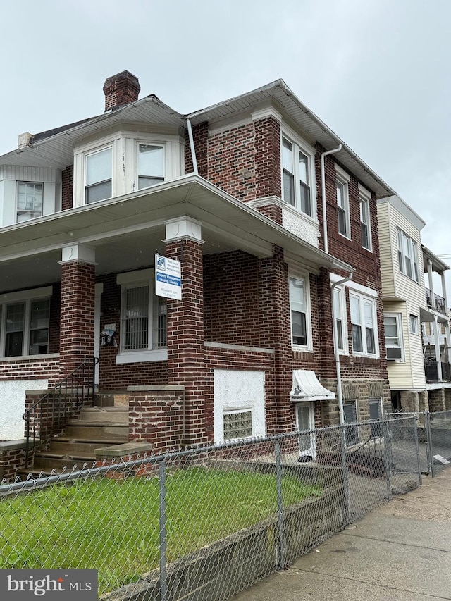 1512 Lindley Ave, Philadelphia, PA 19141 - multi unit property with brick siding and a chimney