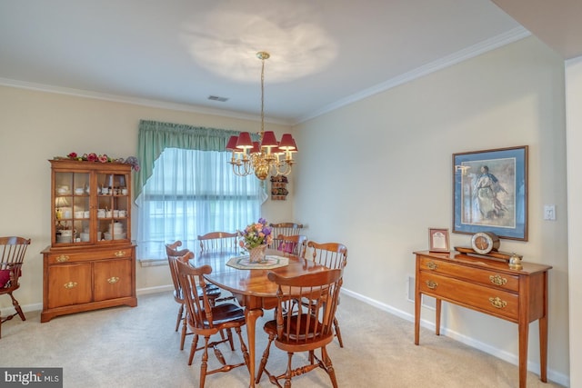 73 Springmill Dr, Middletown, DE 19709 - dining space with a chandelier, crown molding, light carpet, and baseboards