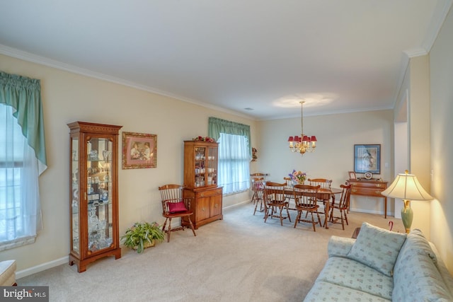 73 Springmill Dr, Middletown, DE 19709 - carpeted living area featuring ornamental molding, a chandelier, and baseboards