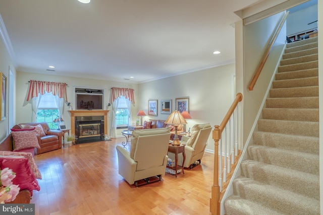 73 Springmill Dr, Middletown, DE 19709 - living area featuring healthy amount of natural light, light wood-style flooring, stairway, ornamental molding, and recessed lighting