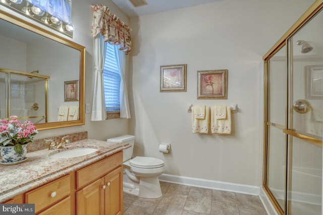 73 Springmill Dr, Middletown, DE 19709 - bathroom featuring vanity, a shower with shower door, toilet, tile patterned flooring, and baseboards