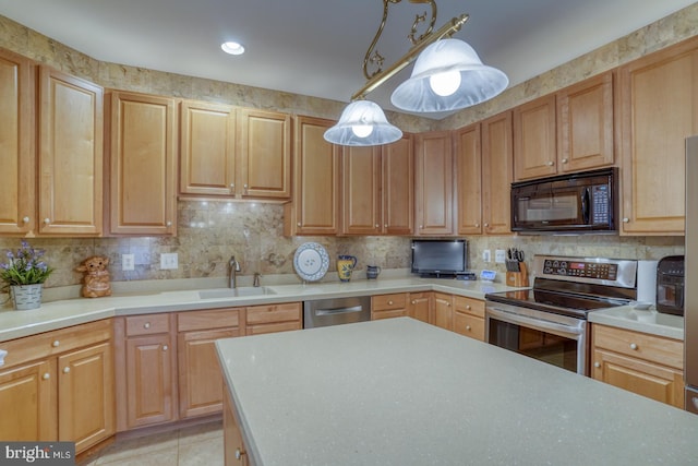 73 Springmill Dr, Middletown, DE 19709 - kitchen with appliances with stainless steel finishes, a sink, light countertops, decorative backsplash, and light tile patterned floors