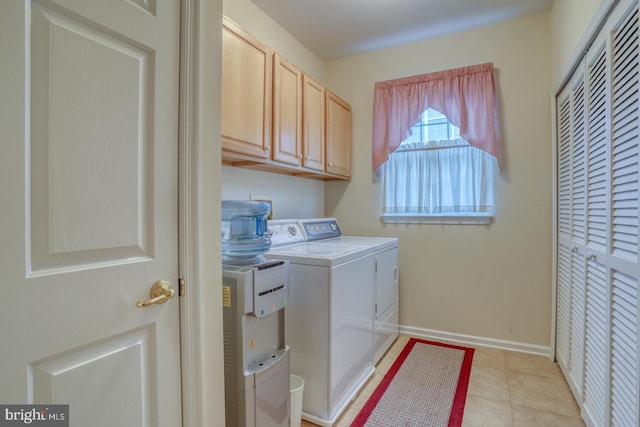 73 Springmill Dr, Middletown, DE 19709 - washroom featuring separate washer and dryer, cabinet space, baseboards, and light tile patterned floors