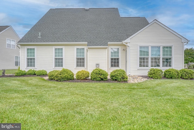 73 Springmill Dr, Middletown, DE 19709 - back of house with a yard and a shingled roof