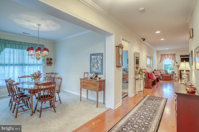 73 Springmill Dr, Middletown, DE 19709 - dining area with a chandelier, ornamental molding, recessed lighting, baseboards, and light wood-style flooring