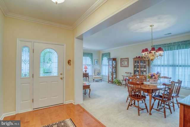 73 Springmill Dr, Middletown, DE 19709 - entrance foyer featuring a chandelier, crown molding, baseboards, and wood finished floors