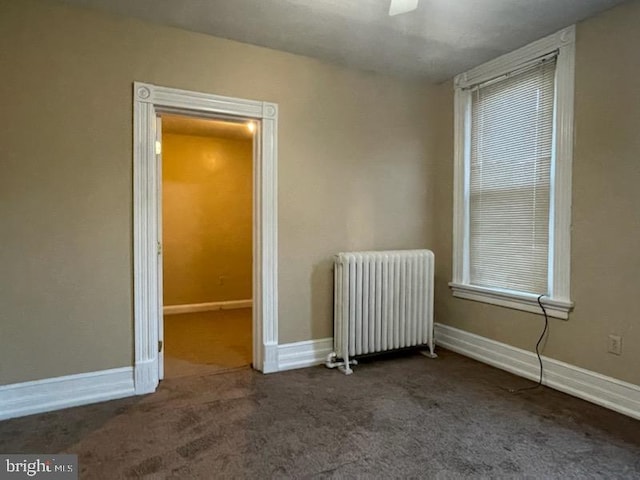 102 N 11th St, Reading, PA 19601 - carpeted spare room with radiator heating unit and baseboards