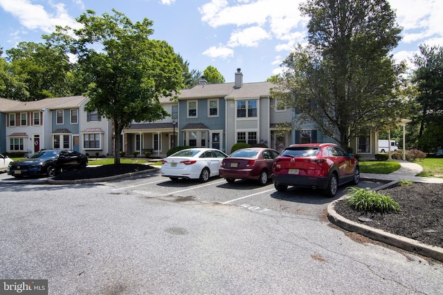507 Essex Ct, Mantua, NJ 08051 - view of front of house with uncovered parking and a chimney