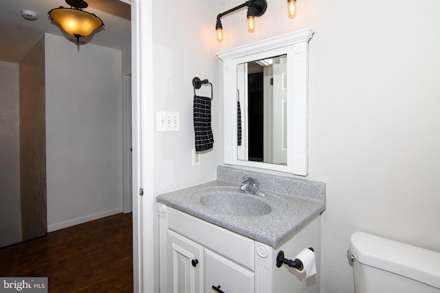507 Essex Ct, Mantua, NJ 08051 - half bath with vanity, wood finished floors, and toilet
