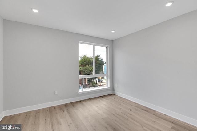 2937 Page St, Philadelphia, PA 19121 - empty room featuring baseboards, light wood-style flooring, and recessed lighting
