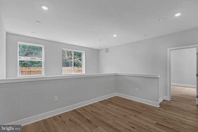 2937 Page St, Philadelphia, PA 19121 - empty room featuring baseboards, wood finished floors, recessed lighting, and a smoke detector