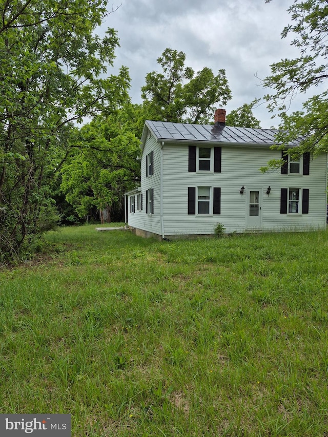 1106 Moreland Gap Rd, New Market, VA 22844 - view of property exterior featuring a standing seam roof, a chimney, and metal roof