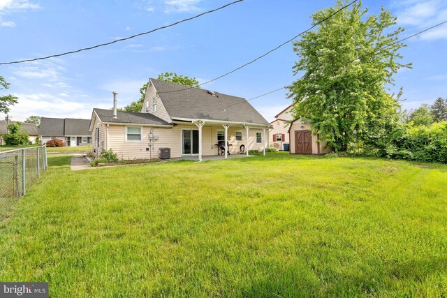 35 Mullshire Ln, Willingboro, NJ 08046 - back of house with a patio and central AC unit