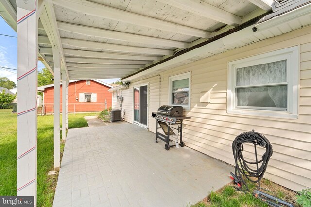 35 Mullshire Ln, Willingboro, NJ 08046 - view of patio / terrace with a grill, a wall mounted air conditioner, and cooling unit