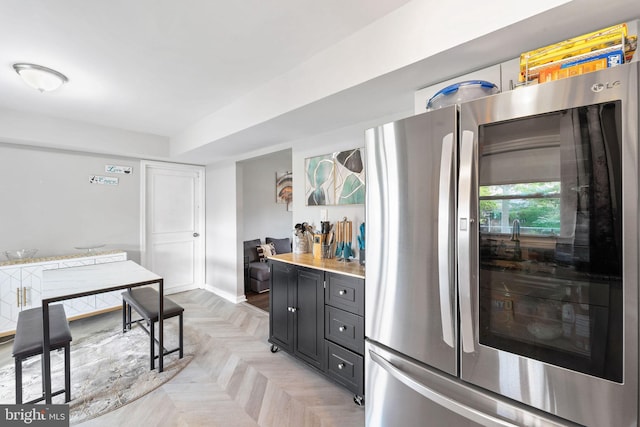 35 Mullshire Ln, Willingboro, NJ 08046 - kitchen with smart refrigerator, dark cabinets, light countertops, and baseboards