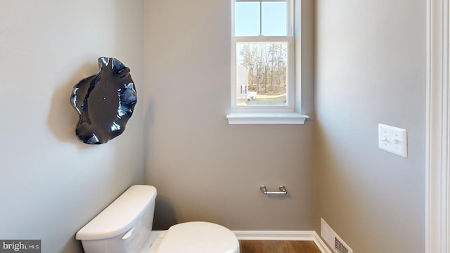 11276 Davisar Rd Unit 80, White Marsh, MD 21162 - bathroom featuring toilet, baseboards, and wood finished floors