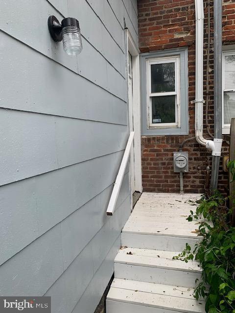 812 Tulip St, Camden, NJ 08104 - property entrance featuring brick siding