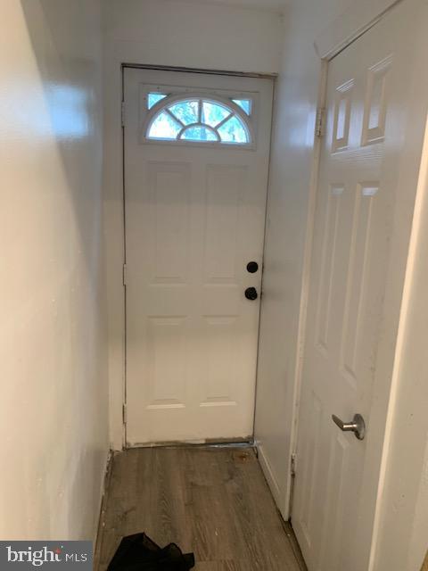 812 Tulip St, Camden, NJ 08104 - doorway to outside featuring wood finished floors