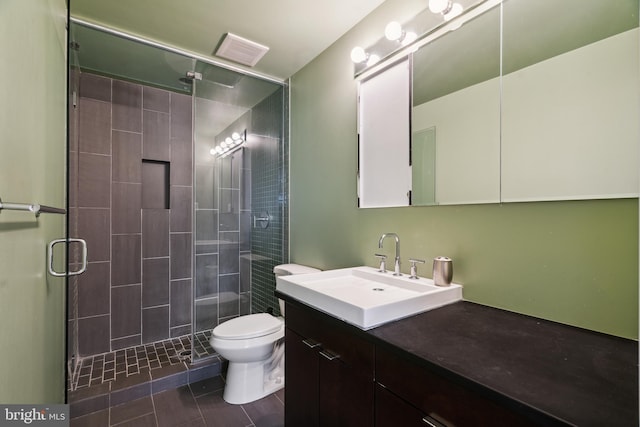 2213 Race St Unit 202, Philadelphia, PA 19103 - full bathroom with vanity, a stall shower, toilet, and tile patterned floors