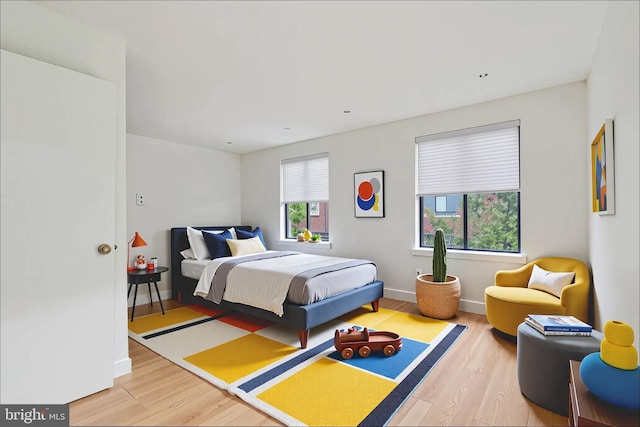 2213 Race St Unit 202, Philadelphia, PA 19103 - bedroom with wood finished floors and baseboards