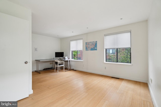 2213 Race St Unit 202, Philadelphia, PA 19103 - home office with wood finished floors and baseboards