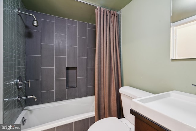 2213 Race St Unit 202, Philadelphia, PA 19103 - bathroom featuring vanity, tiled shower / bath, and toilet