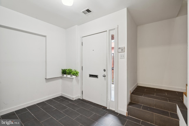 2213 Race St Unit 202, Philadelphia, PA 19103 - entrance foyer featuring baseboards and dark tile patterned flooring