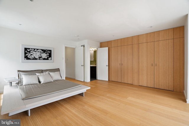 2213 Race St Unit 202, Philadelphia, PA 19103 - bedroom with light wood finished floors