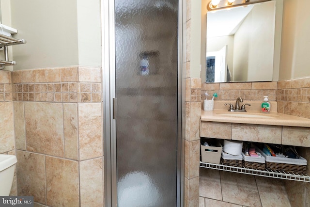 167 Windmill Rd, Willow Grove, PA 19090 - bathroom featuring a shower stall, toilet, vanity, and tile walls