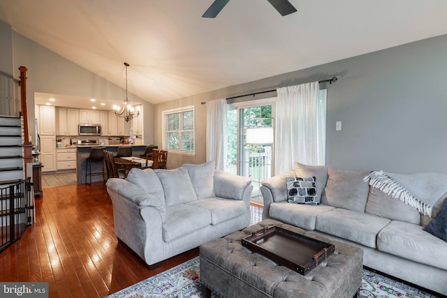 167 Windmill Rd, Willow Grove, PA 19090 - living area featuring a chandelier, dark wood-style flooring, lofted ceiling, stairway, and ceiling fan