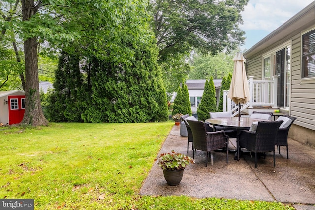 167 Windmill Rd, Willow Grove, PA 19090 - view of green lawn featuring a patio and outdoor dining space