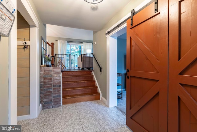 167 Windmill Rd, Willow Grove, PA 19090 - stairway with a barn door and baseboards